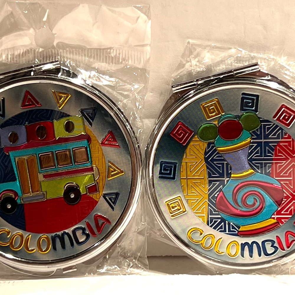 TWO SMALL COLOMBIA COMPACT MIRROR